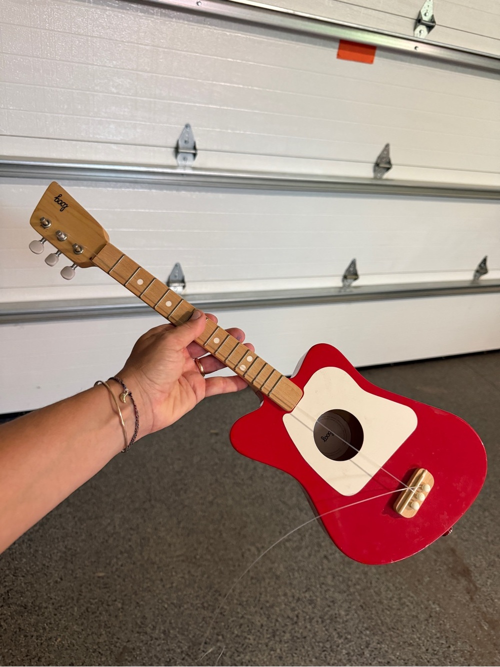 BOOQ Red Kids Wooden Guitar Toy with Natural Neck